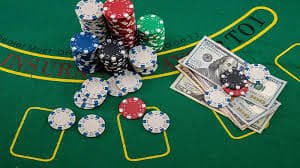 rtp birutoto app showing live blackjack dealer stream and baccarat table options